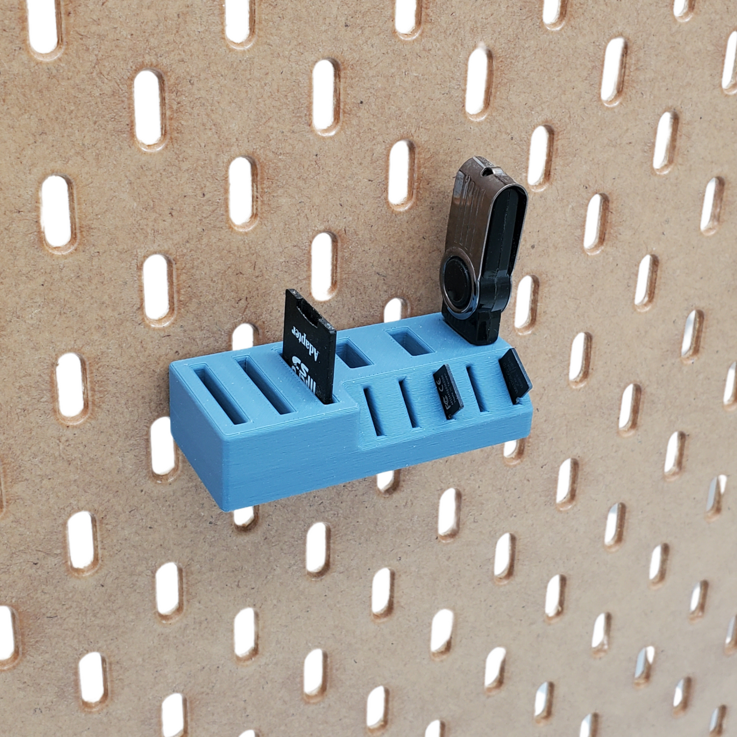 side view of small muted blue small media storage