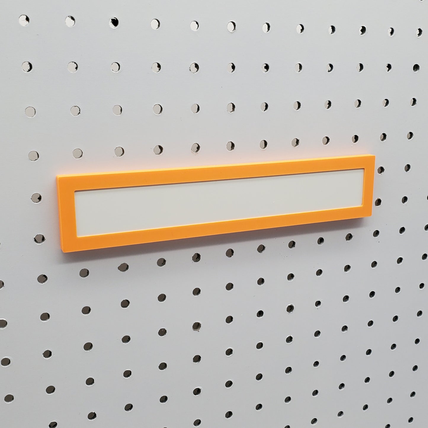 Sunrise Orange Magnet board on a 1/4" Pegboard with no magnets