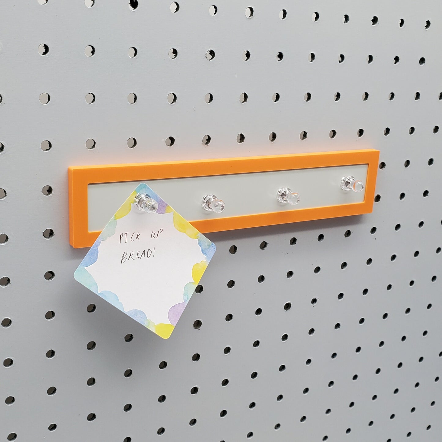 Sunrise Orange Magnet board on a 1/4" PEgboard with Magnets included