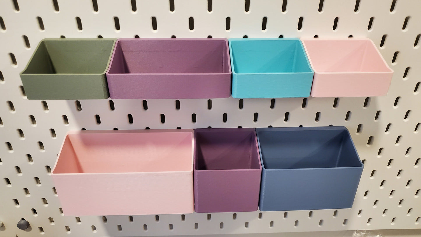 3 Small Low Bins, 1 medium Low Bin, One Small Tall Bin, One Medium Tall bin, and One Large Tall bin