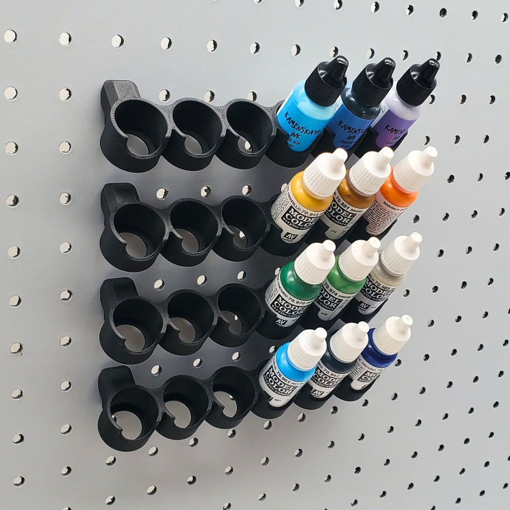 Tilted Model Paint Rack in Charcoal Black on 1/4" pegboard with Model Color paints.