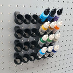 Tilted Model Paint Rack in Charcoal Black on 1/4" pegboard with Model Color paints.