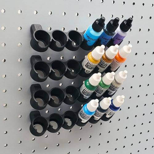 Tilted Model Paint Rack in Charcoal Black on 1/4" pegboard with Model Color paints.
