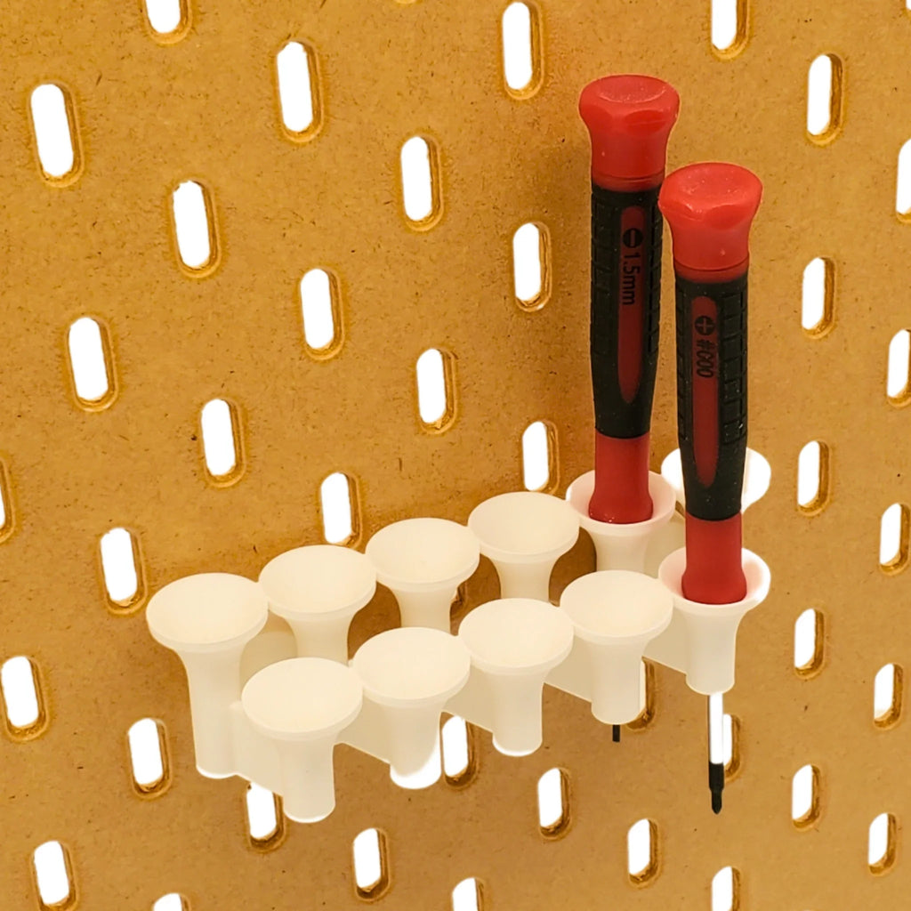 Small Screwdriver Organizer in Cotton White on IKEA SKADIS pegboard with screwdrivers.