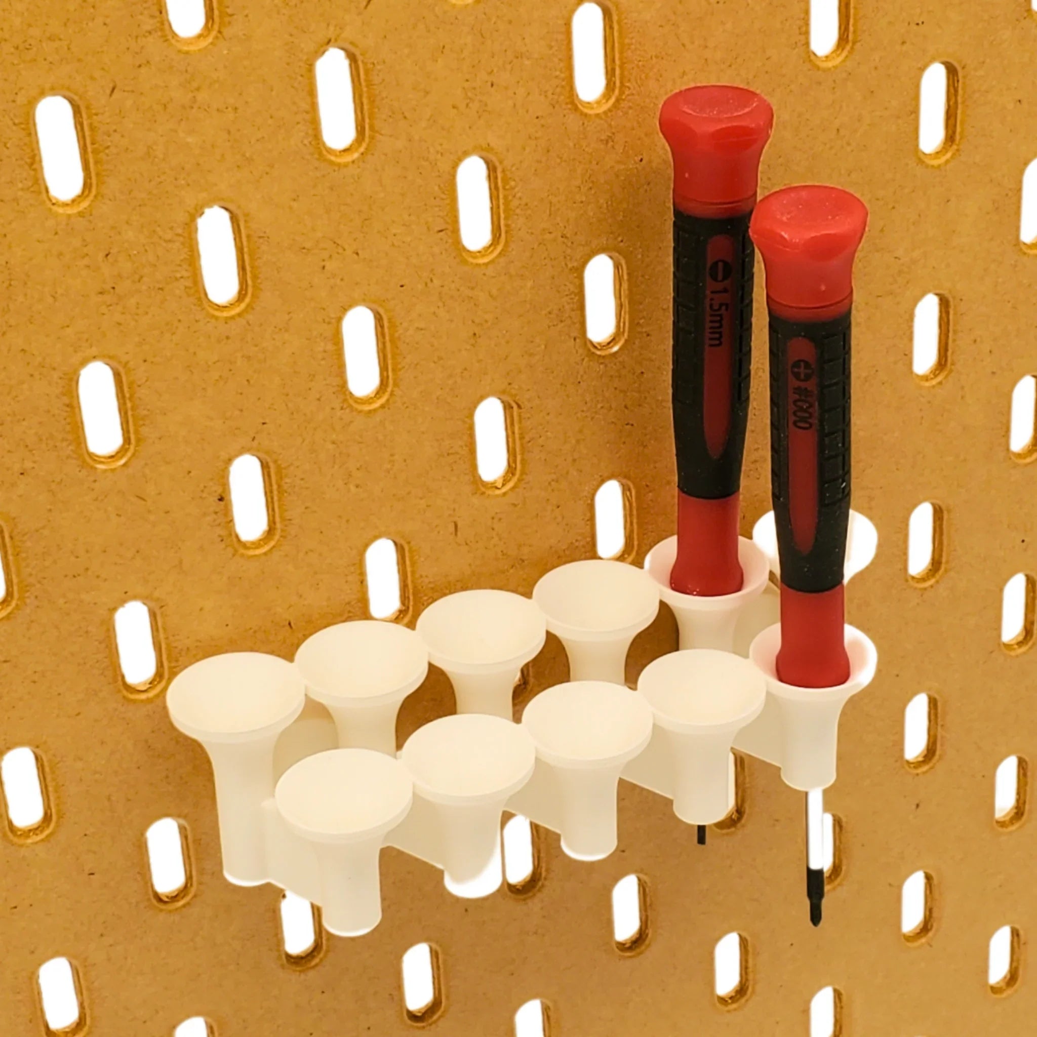 Small Screwdriver Organizer in Cotton White on IKEA SKADIS pegboard with screwdrivers.