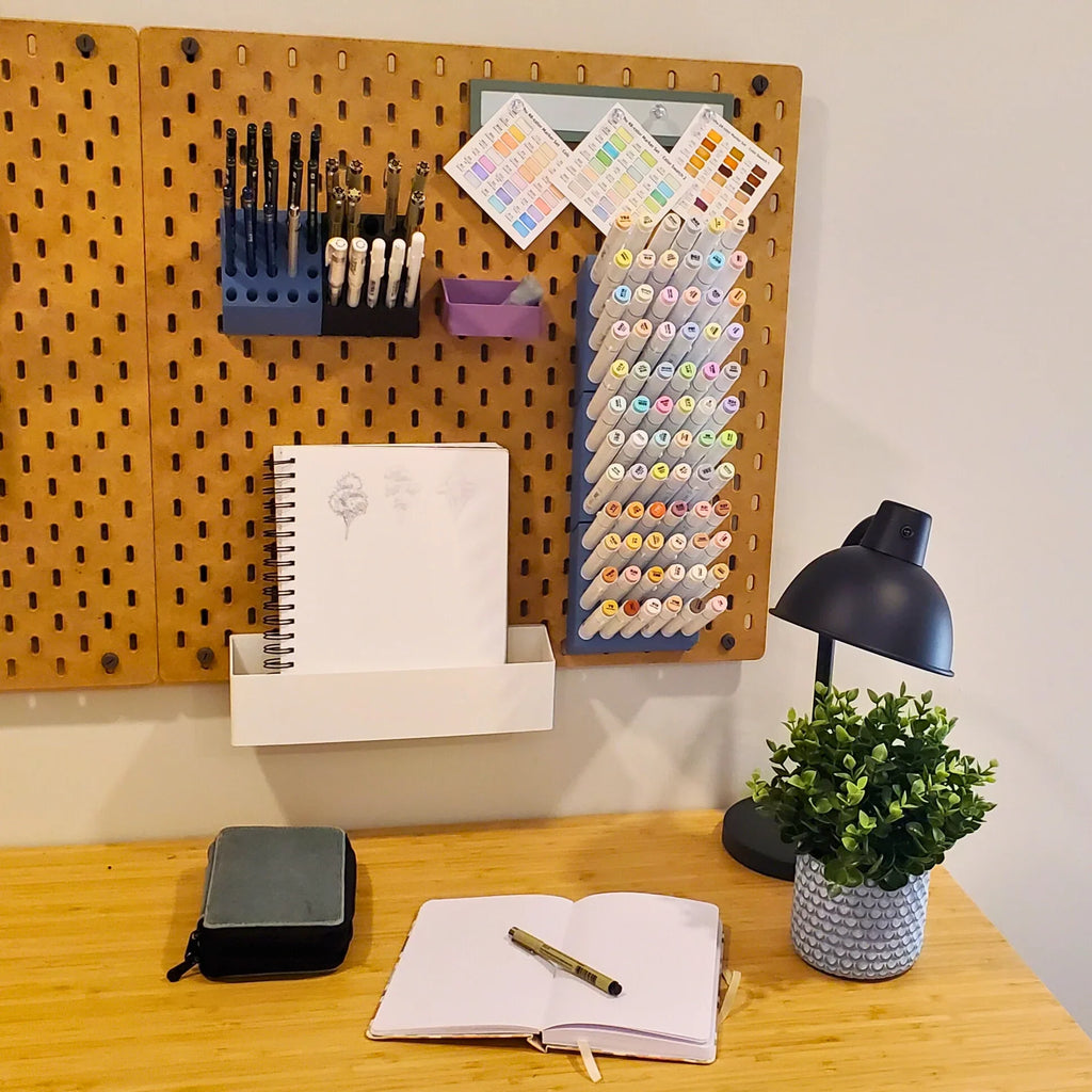 Ohuhu Marker Storage in Charcoal Black on IKEA SKADIS pegboard.