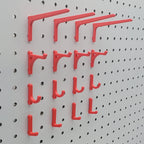 Display Hooks in Light Pink, Teal and Charcoal on IKEA SKADIS pegboard.