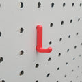 Display Hook in Lava Red on 1/4" Pegboard.