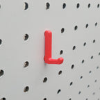 Display Hook in Lava Red on 1/4" Pegboard.