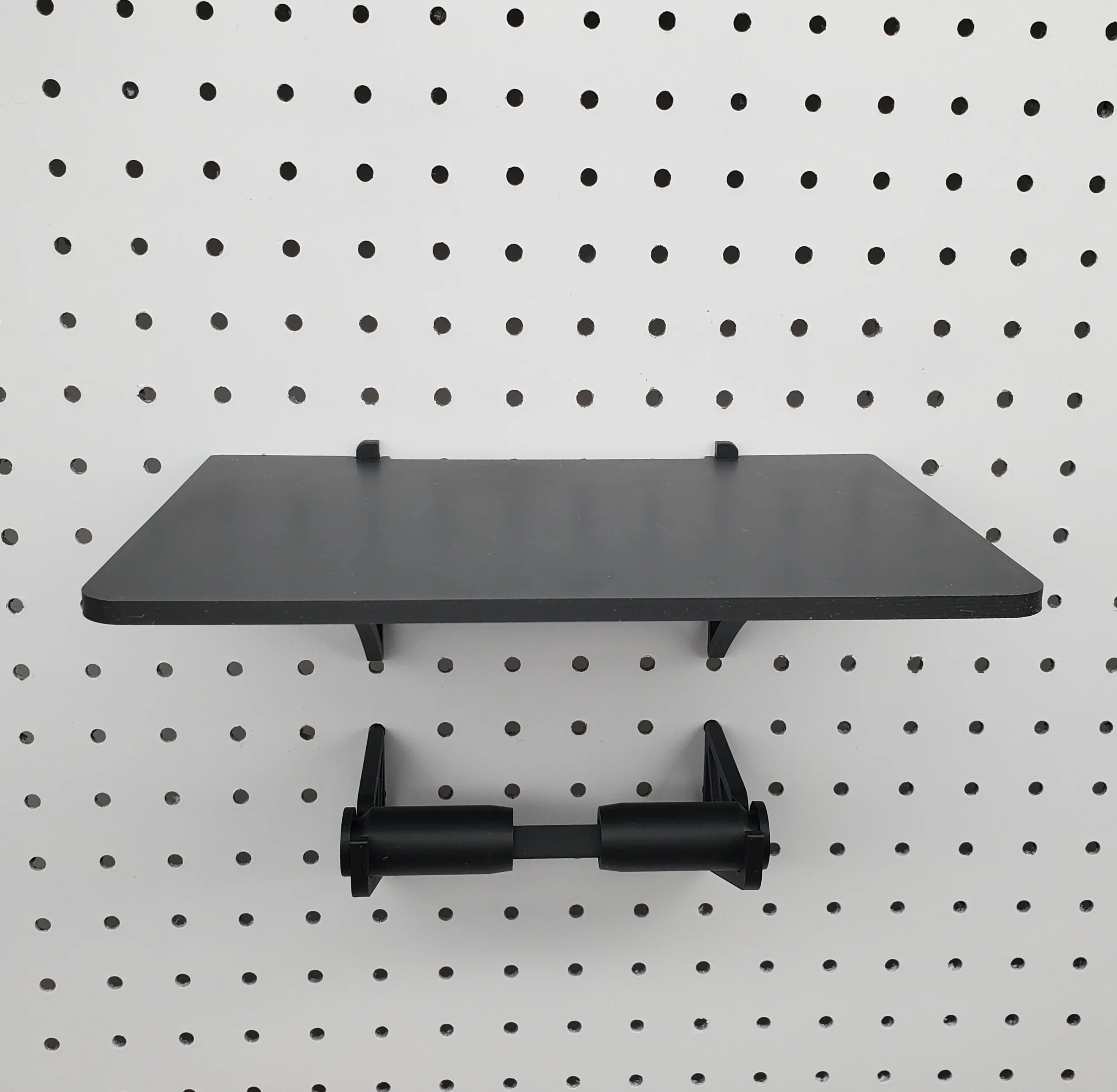 Label Printer Stand and Roll Hooks in Charcoal Black on 1/4" pegboard.
