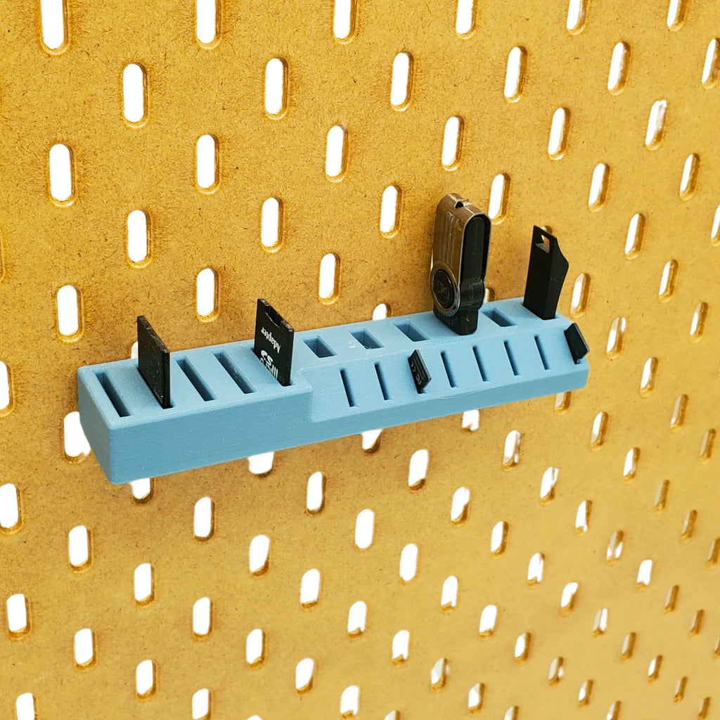 Large Memory Card Holder in Muted Blue on IKEA SKADIS pegboard.
