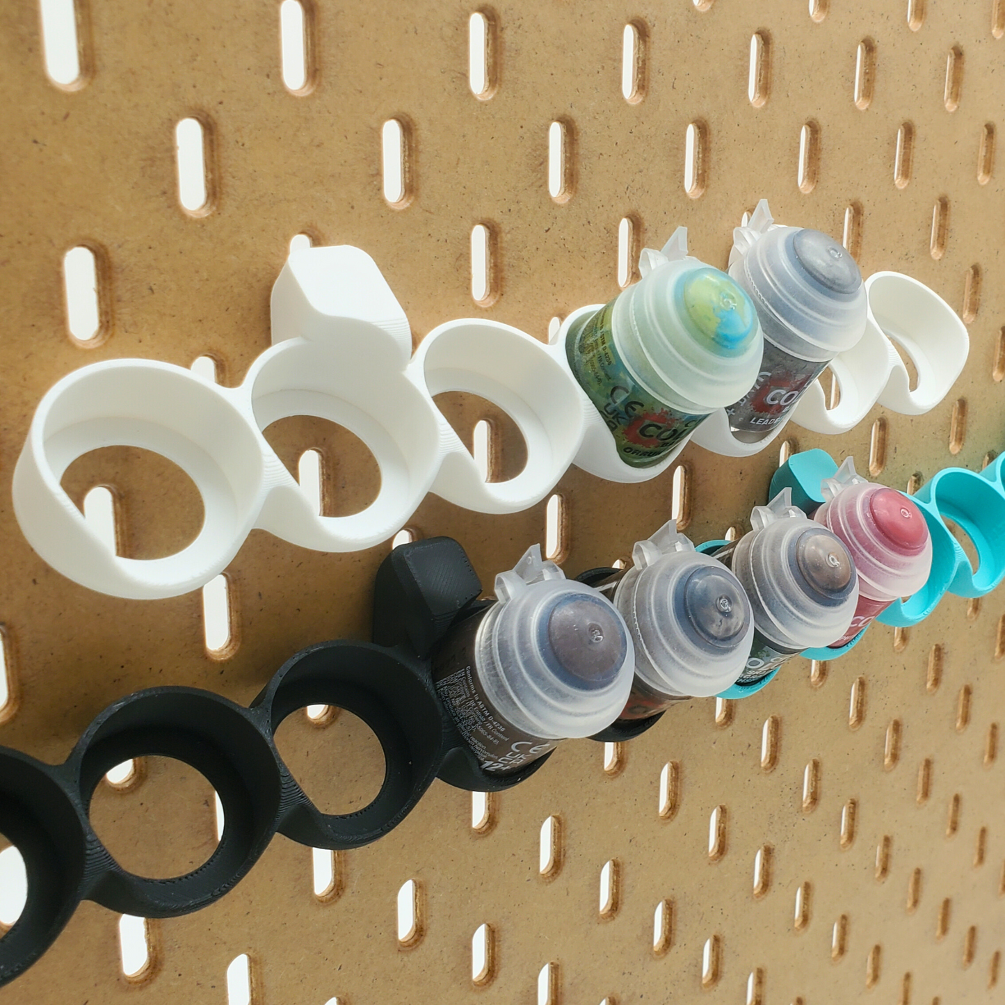 Close up of IKEA SKADIS Paint storage
