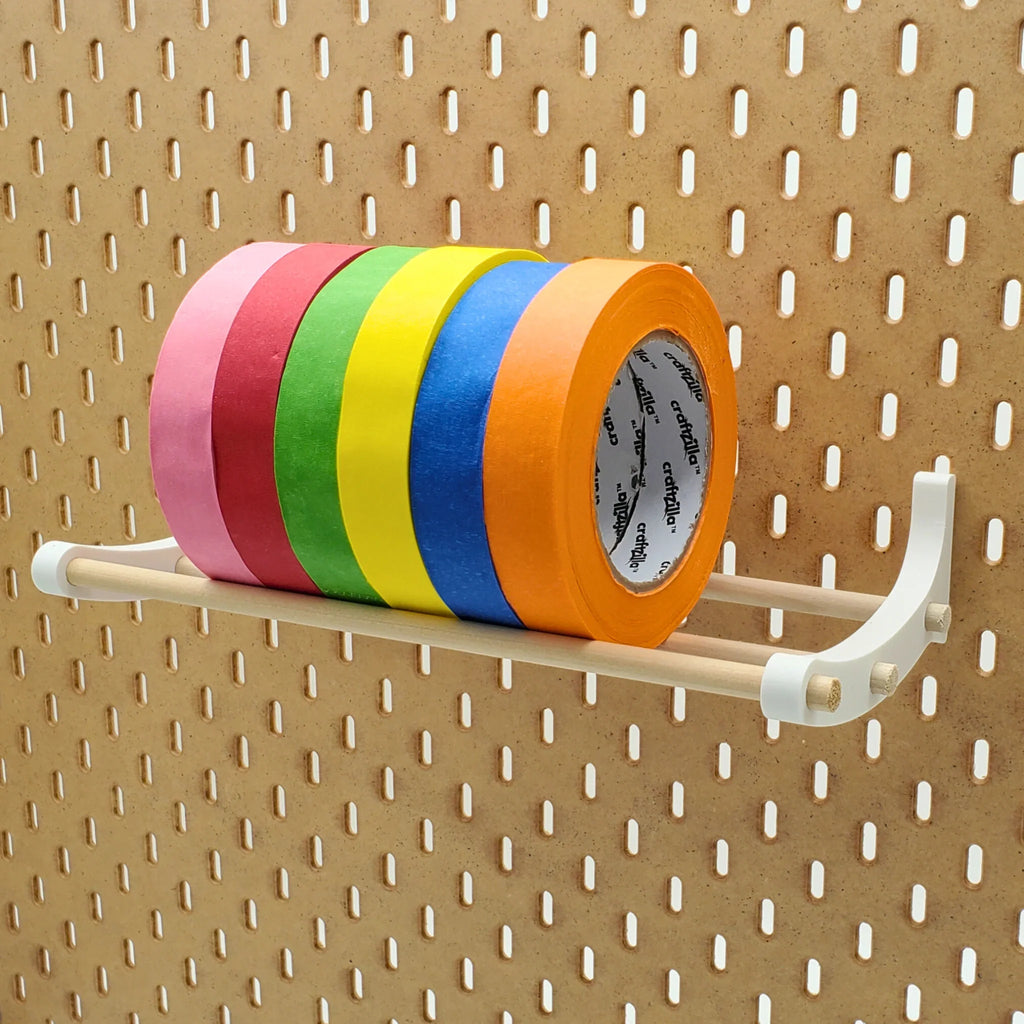 Tape Shelf holding colorful masking tape on IKEA SKADIS pegbaord.