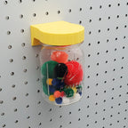 Mason Jar Storage lid in Savannah Yellow on 1/4" pegboard.