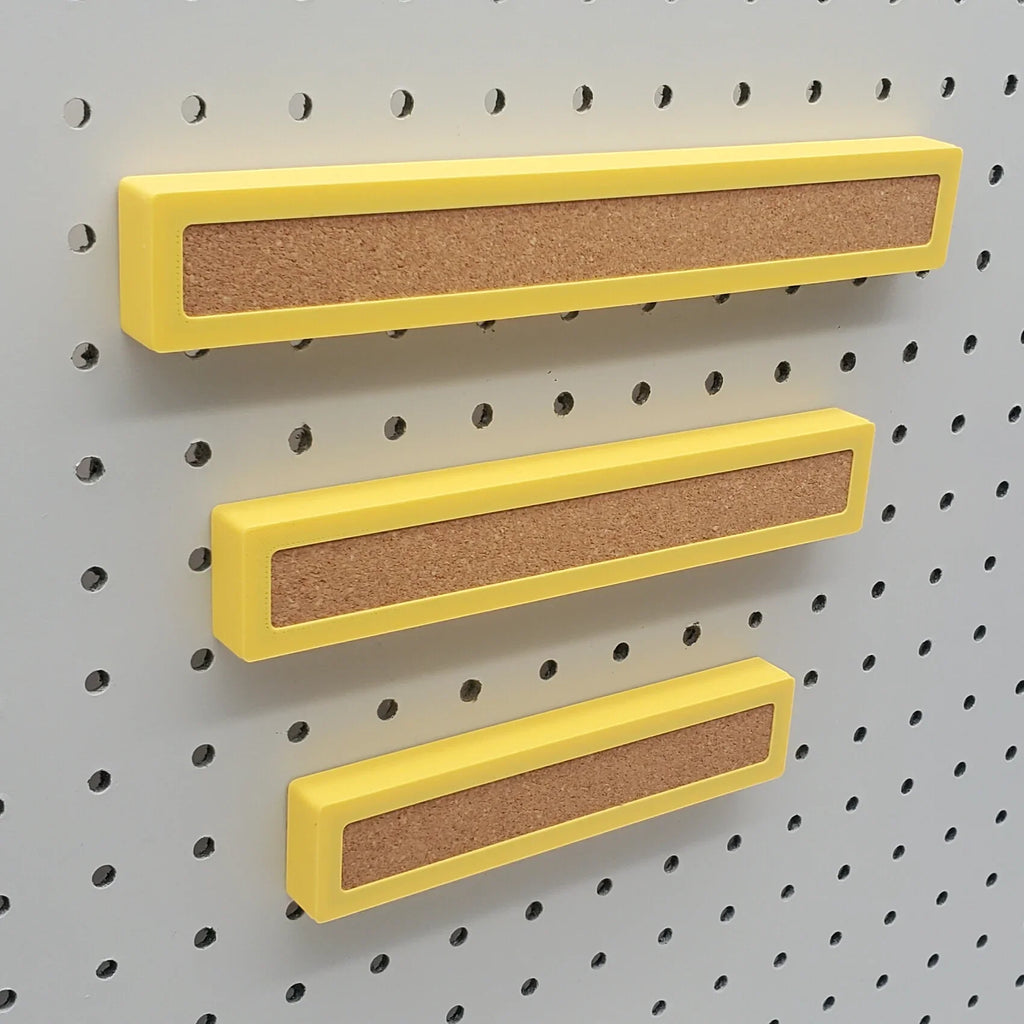 1 Small, 1 Medium, 1 Large Corkboard Strip in Savannah Yellow on 1/4" pegboard.