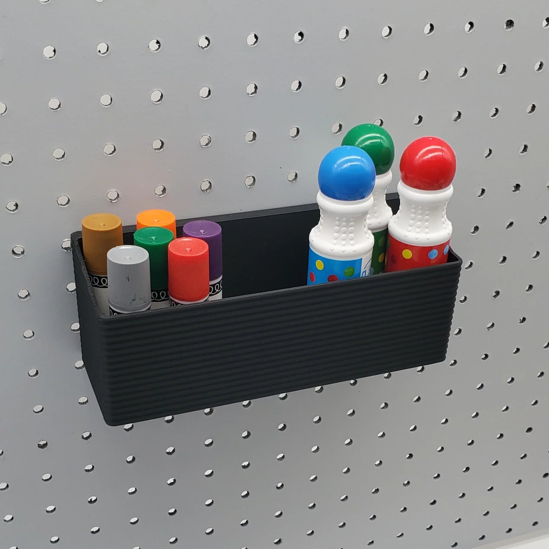 Striped Tall Bin in Charcoal Black on 1/4" pegboard.