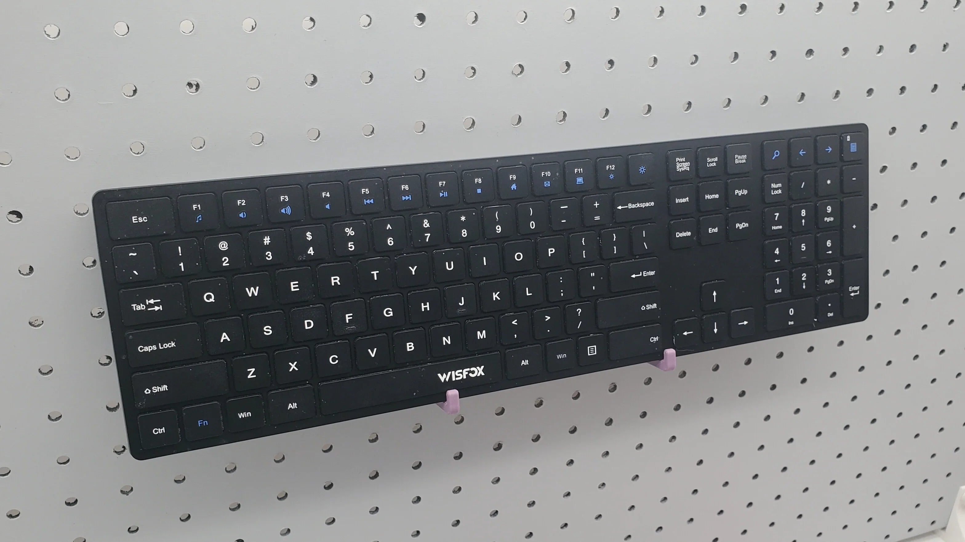 Keyboard Hooks in Muted Purple on 1/4" pegboard.