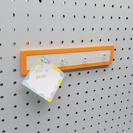 Sunrise Orange Magnet board on a 1/4" PEgboard with Magnets included