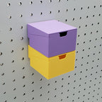 Two Small Stackble Drawers in Lavender Purple and Savannah Yellow on 1/4" Pegboard.