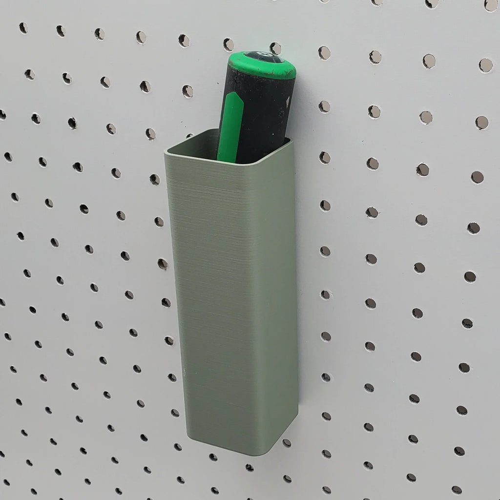 Large Square Bin in Muted Green on 1/4" pegboard with pens.