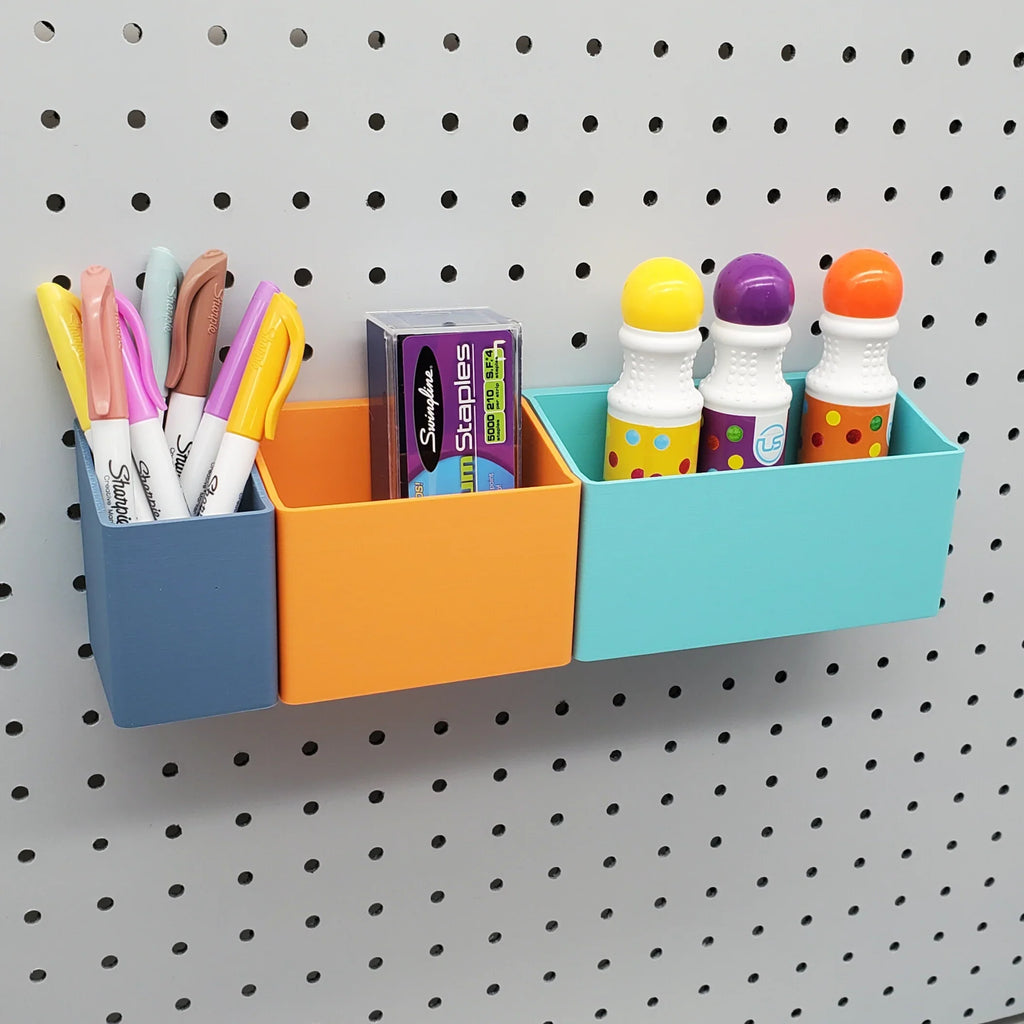 Tall Bins in Muted Blue, Sunrise Orange, and Teal on 1/4" Pegboard.