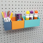 Tall Bins in Muted Blue, Sunrise Orange, and Teal on 1/4" Pegboard.