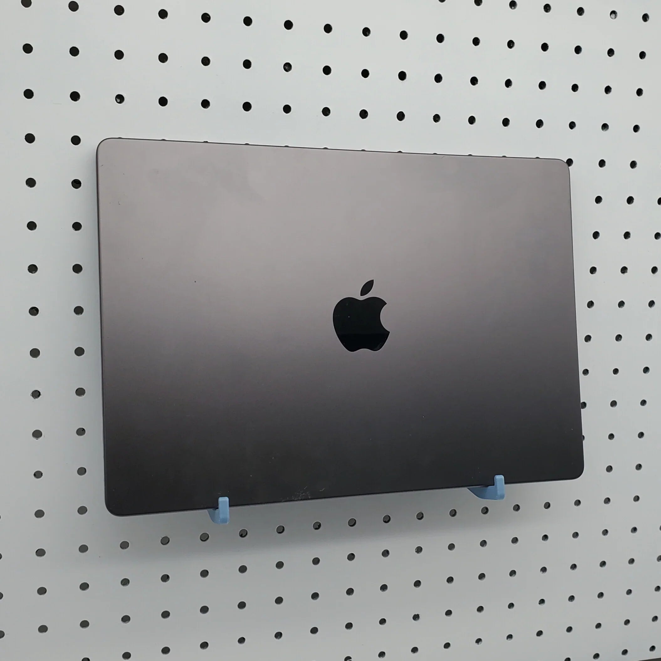 Laptop Organizer hooks in Muted Blue on 1/4" pegboard.
