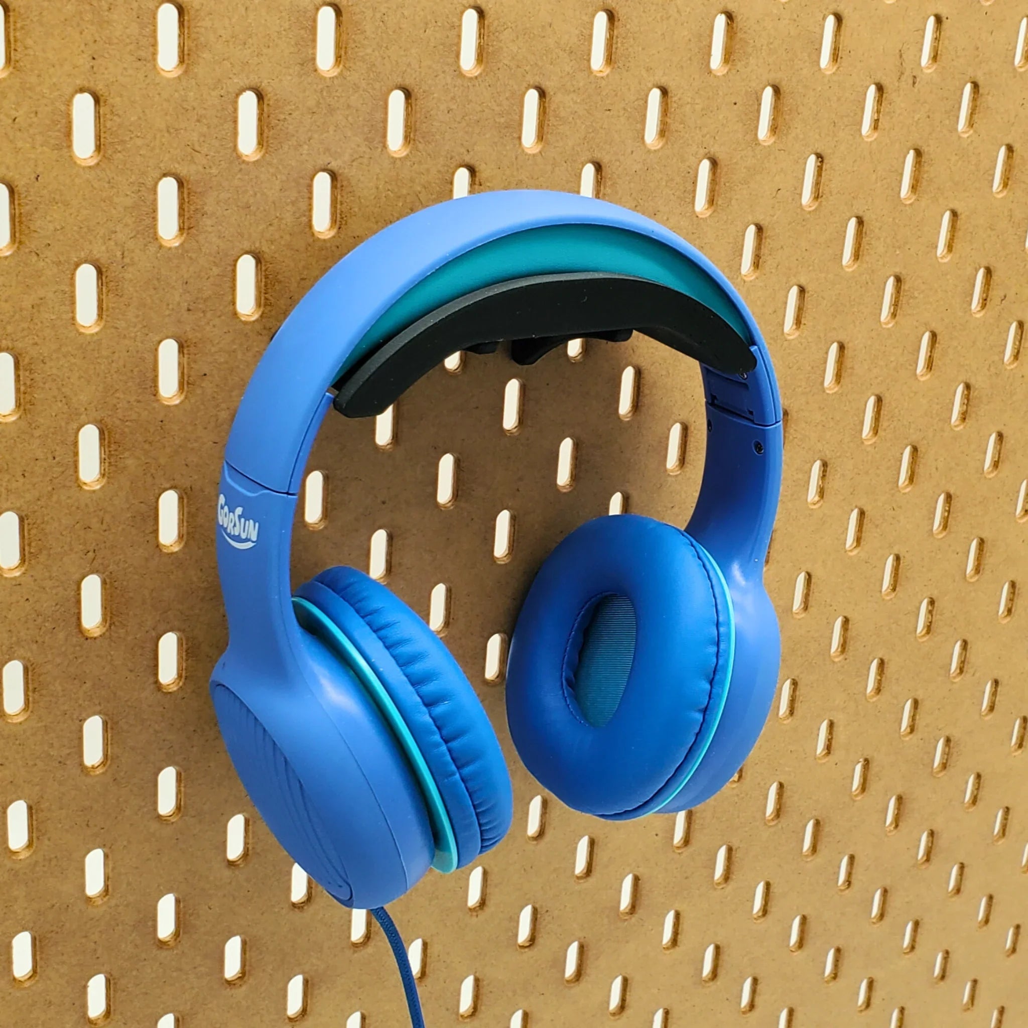 Headphone Holder in Charcoal Black with blue headphones on IKEA SKADIS pegboard.