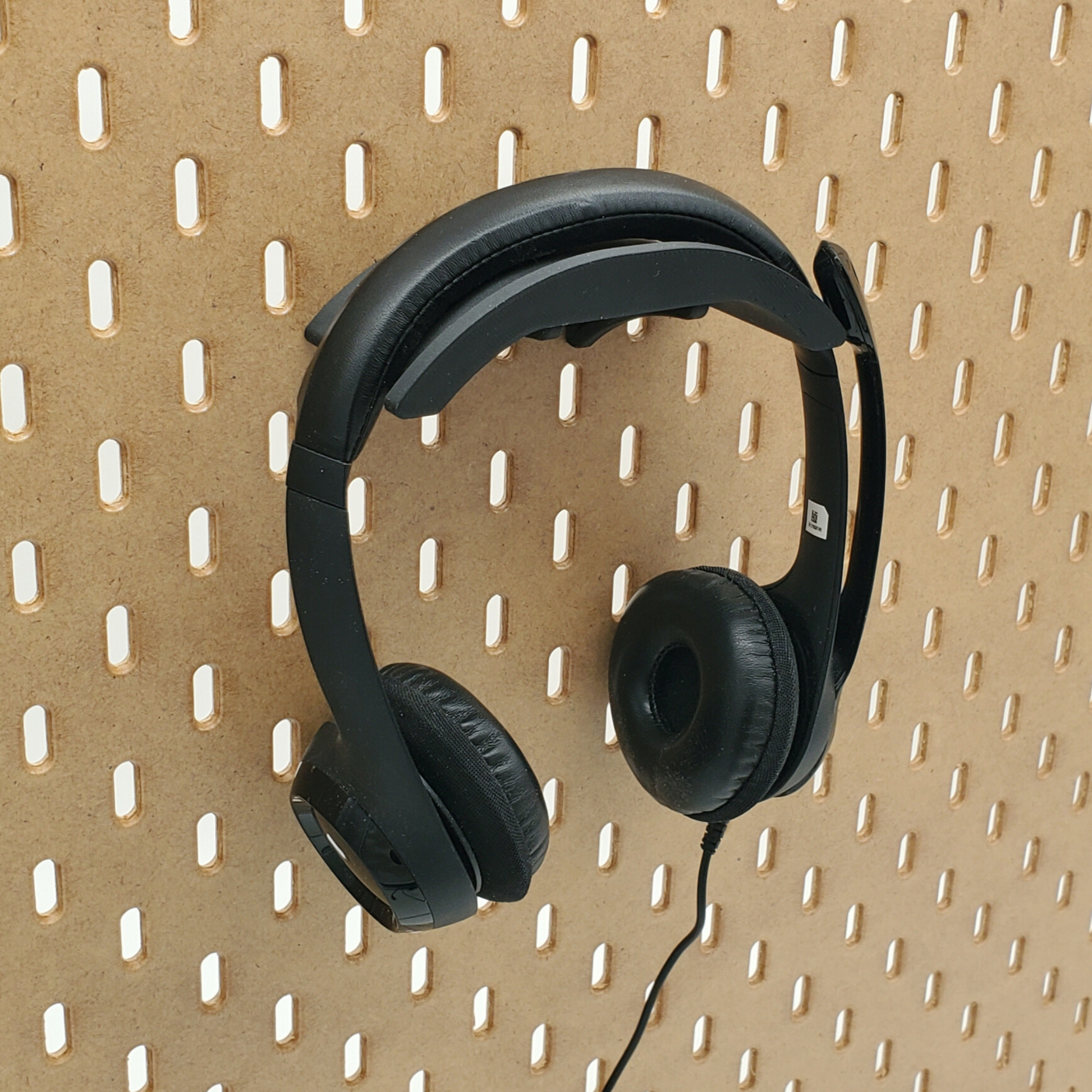 Black Headphone mounted on SKADIS pegboard