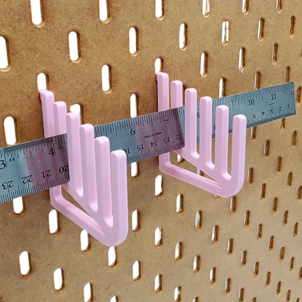 Vertical Ruler Organizer in Light Pink on IKEA SKADIS pegboard.