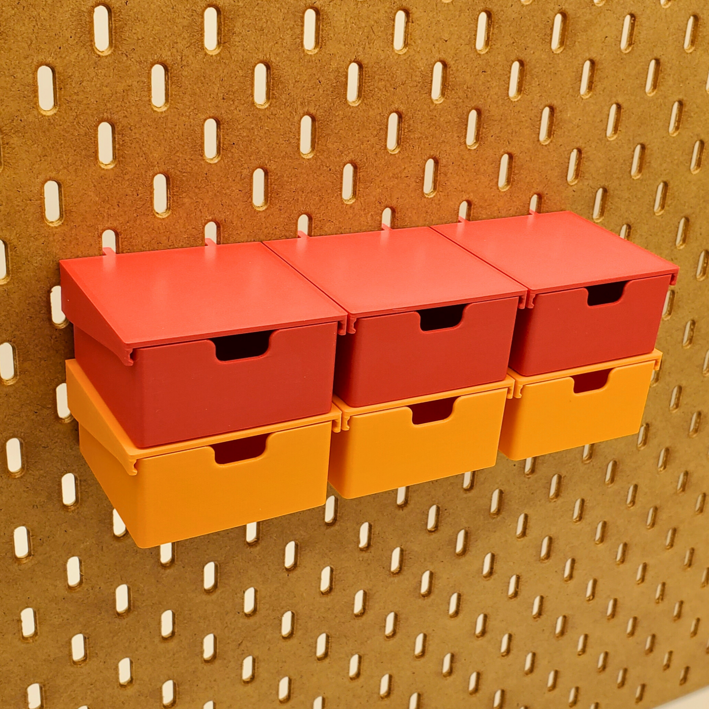 Three Lava red and three sunrise orange drawers