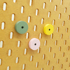 Small Magnetic Tool Holder in Muted Green, Savannah Yellow, and Light Pink on IKEA SKADIS pegboard.