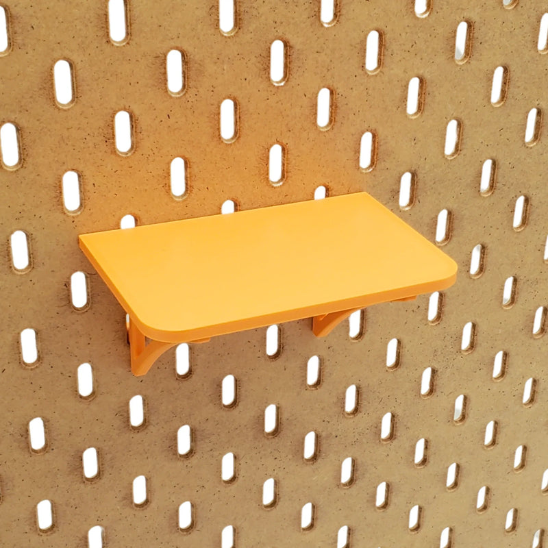 Small Shallow Shelf in Sunrise Orange on IKEA SKADIS pegboard.