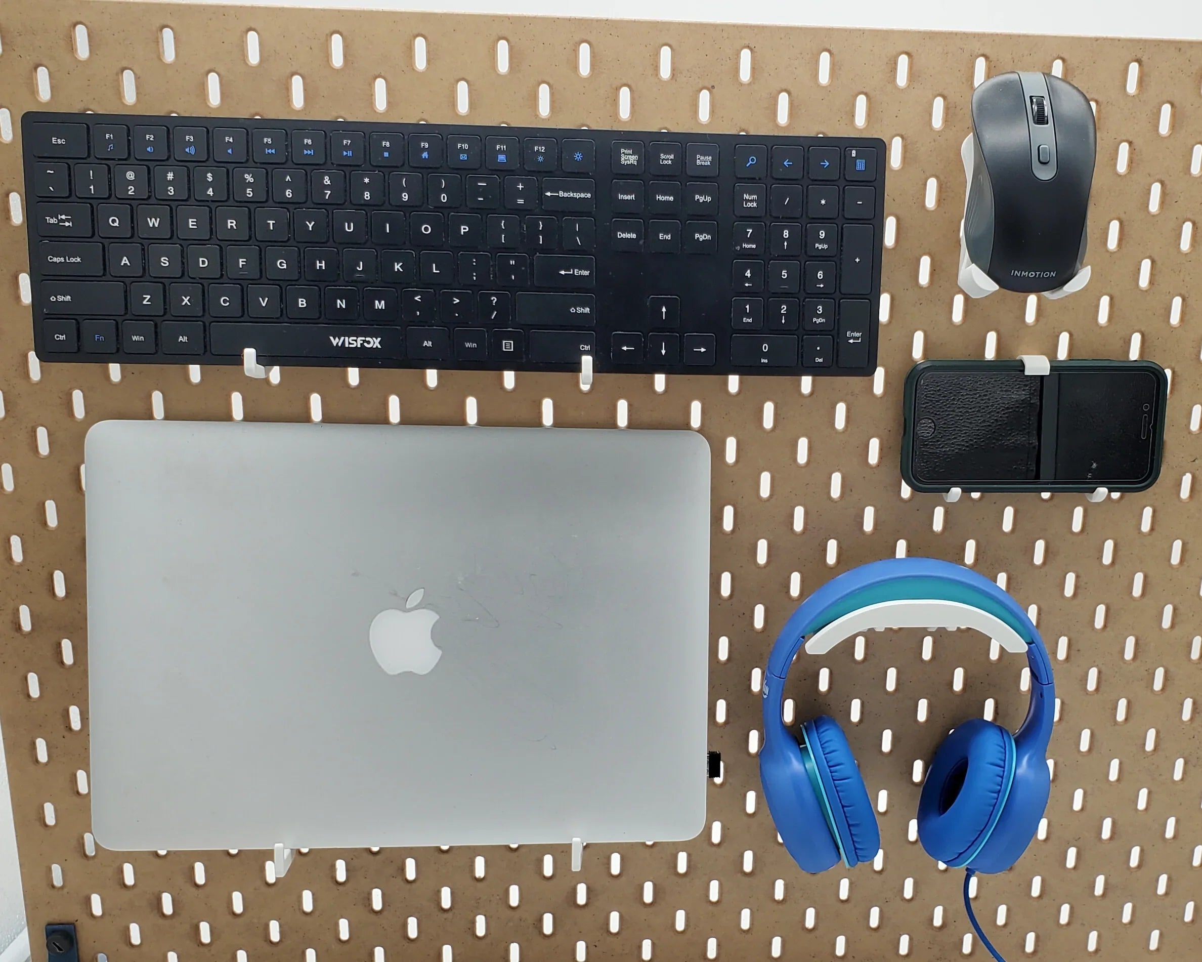 Tech Organizer Kit in Cotton White on IKEA SKADIS pegboard.
