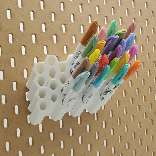 Cotton White Hex Marker Storage with colored sharpies.