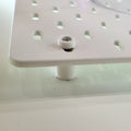 Detail of Mounting Hardware Kit in Cotton White on IKEA SKADIS pegboard.